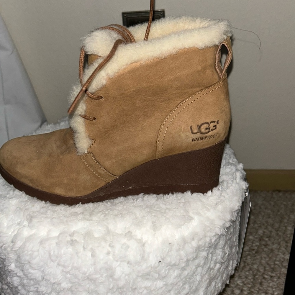 Tan Ugg booties. 6.5
